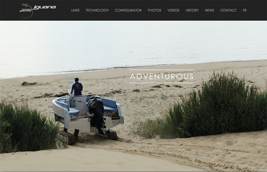 Bateau amphibie Iguana Yachts descendant une plage vers la mer